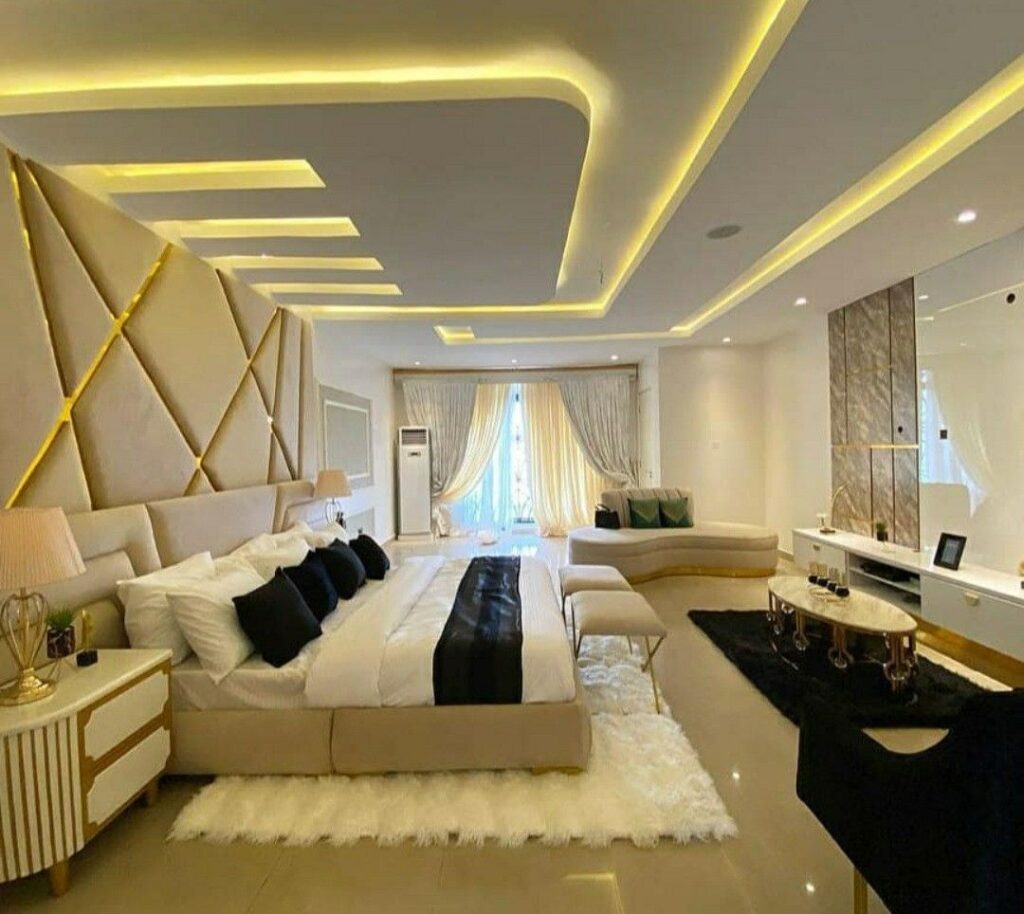 living room gypsum ceiling designs Kenya, gypsum ceiling with LED strip lights, modern sitting room ceiling designs, gypsum ceiling with concealed LED lighting, tray gypsum ceiling living room, floating gypsum ceiling with LEDs, layered gypsum ceiling designs Kenya, living room ceiling renovation cost, gypsum ceiling installation Nairobi, stylish living room false ceiling, gypsum ceiling with cove lighting.
